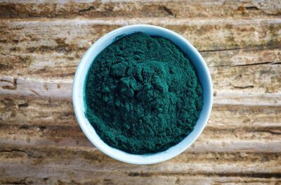 thinkstockphotos magone white bowl of dark green spirulina algae powder 1
